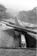 Looking down to the railway aqueduct at Leawood, with a double headed diesel-hauled passenger train heading north, the first engine being a Western Region Hymek - well off its usual stamping ground. (Photo - Geoffrey Sheldon)