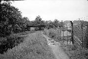 Looking east from Hagg Tunnel towards the bridge carrying the water mains pipes. The bridge is still in place today, but now crosses the road running through Stevenson's Dye works. (Photo - Brian Lamb)