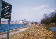 The walk from Golden Valley to Ironville was a very pleasant one, until the reservoir level was lowered by two metres and the canal filled in. This 1960's view by Ian Moss shows the village of Ironville before the council unsympathetically (ie cheaply) modernised and "restored" the houses