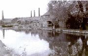 In the early part of the 20th century, the buldings of Codnor Park Forge dominated the Ironville flight. They have now all been swept away and the site opencasted