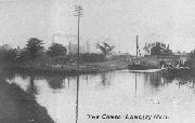 A rare photograph of working boats, and, yes, it is just the Cromford still although it is below Lock 14. The Erewash finished in the basin to the left, so the wide boat, probably an Upper Trent Boat, passing the tied up pair of narrowboats, is just leaving our canal