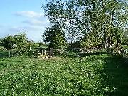 A view southwards from Stoneyford shows the route past the house and over the lane.