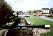 Langley Mill Lock, whilst being regarded as the head of the Erewash Canal is in fact the first lock of the Cromford. It was restored many years ago by the Erewash Canal Preservation & Development Association. The section of the canal stretching some 600 yards into the distance was excavated over a number of years to provide a dry dock and moorings. The Nottingham Canal joined the Cromford here: the swing bridge on the right of this picture leads to the present-day basin which was originally this canal.