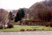 This shot was taken across the 'Lockwood's Gap' - the creation of the new access for the site removed the canal from immediately in front of the photographer to a point in the distance - the glasshouse in the gap in the trees in the centre of the picture is built on the line.