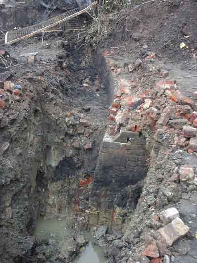 So that's what it's all about. The north-east wing wall curving towards the camera and the remains of the bridge arch running from left to right.