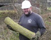 Moose, the Work Party Organiser, pictured with the Captain's Log!