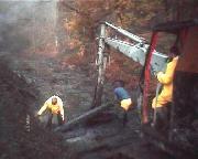 Just west of Gregory Tunnel. The Smith 14 excavator is literally floating on a raft of brushwood with sleepers on top. The mud here was at least 8ft deep, and the task was like operating on a vast jelly.