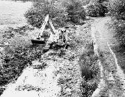 Approx 1973. The Smith 14 excavator approaches Bridge 1 (ADS)