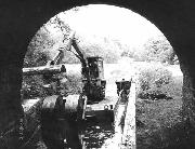 The floating machine struggles to exit the Gregory Tunnel to start on the winding hole behind.