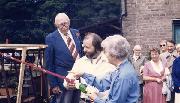 The Duchess of Devonshire christens the new passenger boat "Duchess". Shown in this photo are (left to right): Dr Desmond Stoker (Chairman), Simon Stoker (General Manager), The Duchess of Devonshire. In the background are a number of councillors, and on the far right Peter Clark (Planning Officer). This boat was until recently in quite a sorry state, but was restored in 2006. It is now moored at the Wharf Shed, High Peak.