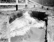 The results of one pumping stroke - 3 tons of water (approx 750 galls) enter the canal! To prevent surging in the pipe and possible damage to the valves, we left the stop planks in permanently. The results of the pump stroke were very impressive!