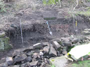 A further section of wall is dismantled